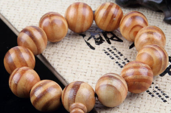红松木手串怎么盘