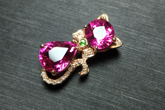 足金999和au750的区别