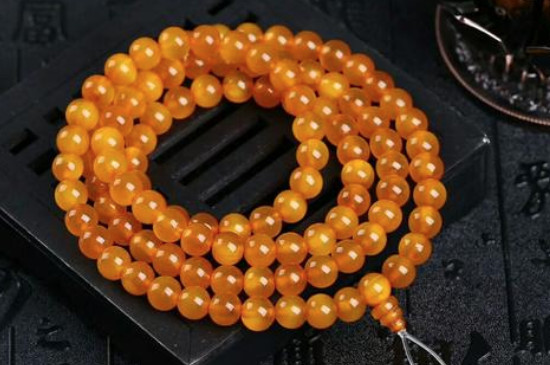 真假黄金甲手串区别